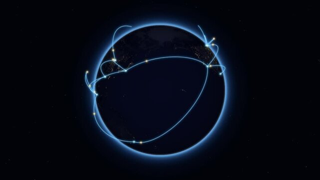 Rotating planet earth at night with glowing blue global network connection lines orbiting the globe