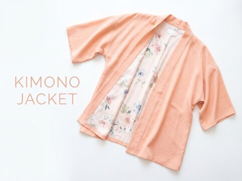 Peach kimono jacket with floral lining, elegant silk haori garment on white background, stylish feminine outerwear for fashion retail and lifestyle