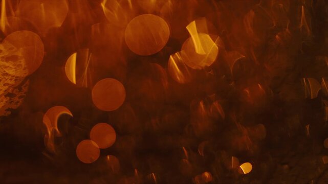 Night rain bokeh lights on window with colorful blurred traffic and abstract golden glow, 4K