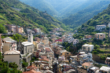 Fototapeta premium Panoramic view of Riomaggiore village in Cinque Terre