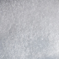Fototapeta premium Macro shot of frozen diamond dust snow surface