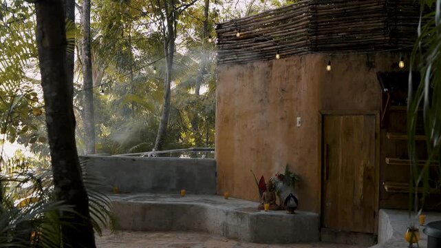 Exterior view of a traditional Mayan temazcal sweat lodge sauna in Peten, Guatemala.