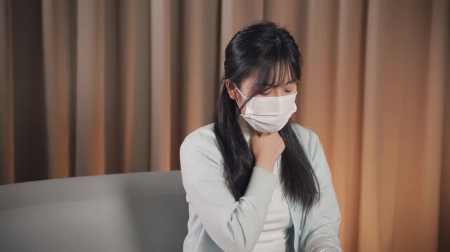 Sick woman experiencing illness at home, suffering from cough sore throat for flu virus, cold symptoms, infection respiratory disease. Healthcare physical and emotional support throat care therapy