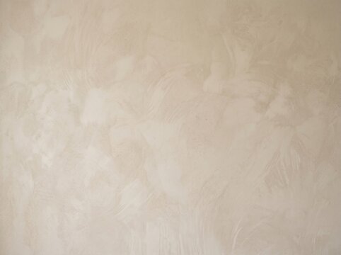 Soft Beige Limewash Wall Texture Background with Subtle Brush Marks, Neutral Plaster Surface, Minimal Vintage Finish and Empty Copy Space