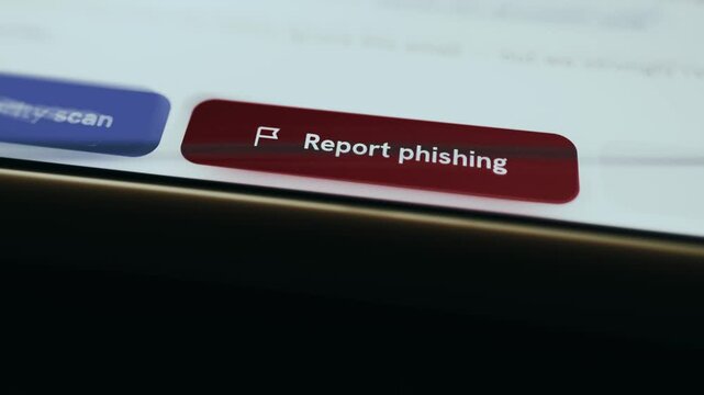 User selects action button Report Phishing