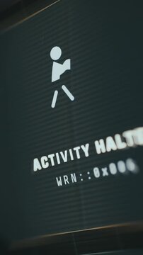 Animated status icon indicating halted activity