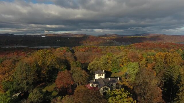 Aerial view of the Samuel F. B. Morse house at Locust Grove Historic Site with autumn foliage and rolling hills in Poughkeepsie, New York, United States.