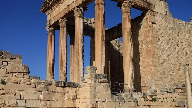 Majestic Capitol Temple and Stone Columns in Ancient Roman Settlement of Dougga, Tunisia. Historic Landmark,  in North Africa.