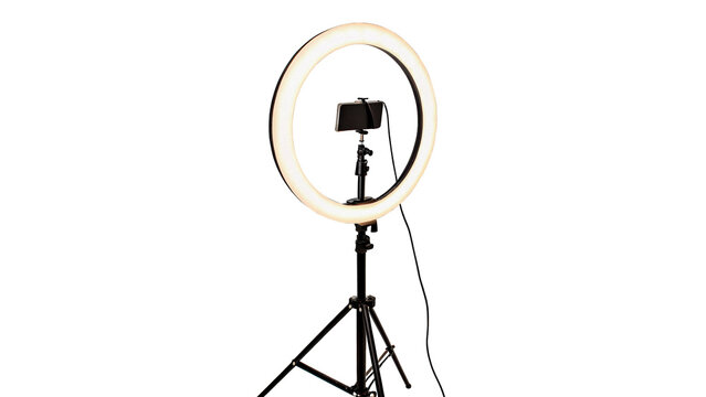 Professional LED ring light with smartphone holder on tripod isolated on a transparent background video equipment