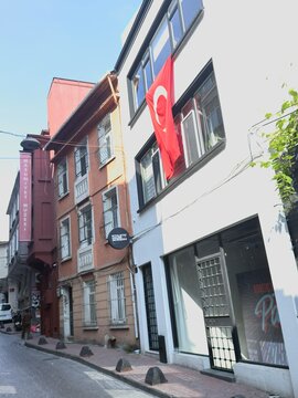 ISTANBUL, TURKEY - MAY 22, 2026: Street view with a signpost of the famous Museum of Innocence (Masumiyet Muzesi) founded by novelist Orhan Pamuk in the historic Beyoglu district.