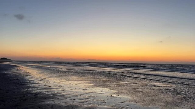 Norderney beach at dusk with copy space
