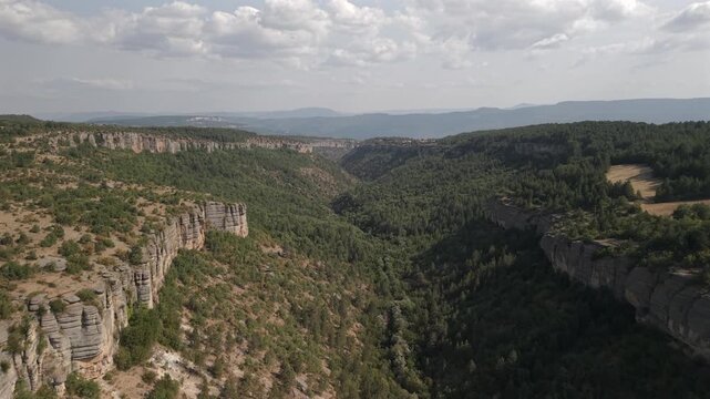 4K 10-bit drone shot flying forward through the deep rocky valley of Tokatli Canyon in Safranbolu, Turkey