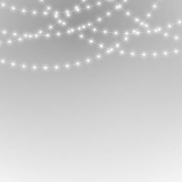  Luxurious white garland shines with magical holiday lighting. Delicate details enrich premium seasonal designs. Transparent background PNG.
