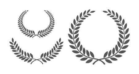 Three dark grey laurel wreaths of varying sizes a white victory achievement success © Mehedi