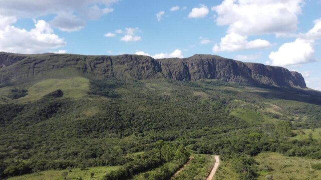 Aerial views of the towering cliffs and escarpments of Serra da Canastra, Brazil, showcasing dramatic rock formations, vast plateaus, rugged landscapes, and the untouched beauty of the Brazilian highl
