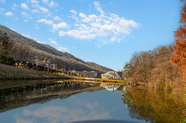 Naklejka premium Scenery of Myong Su Dang Lake with sky could clear in autumn.
