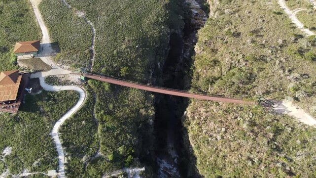 Aerial views of the Capit&oacute;lio Canyons in Minas Gerais, Brazil, showcasing dramatic rock cliffs, emerald waters of Furnas Lake, breathtaking landscapes, and one of the country's most iconic natural att