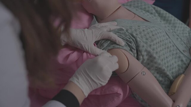 Health sciences students participating in a practical training session.