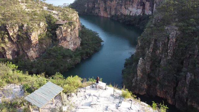 Aerial views of the Capit&oacute;lio Canyons in Minas Gerais, Brazil, showcasing dramatic rock cliffs, emerald waters of Furnas Lake, breathtaking landscapes, and one of the country's most iconic natural att