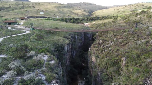 Aerial views of the Capit&oacute;lio Canyons in Minas Gerais, Brazil, showcasing dramatic rock cliffs, emerald waters of Furnas Lake, breathtaking landscapes, and one of the country's most iconic natural att
