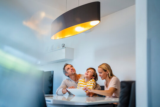 Family controlling ceiling lamp with tablet PC in Smart Home