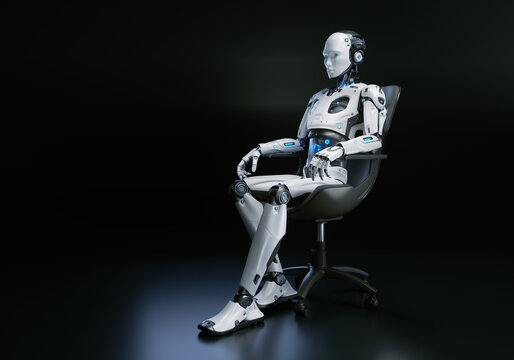 An humanlike robot sits in a chair