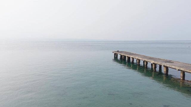 Aerial Drone Dolly Reverse Pier Coastal Dock Sea Island Landscape View Philippines Corregidor Island Manila
