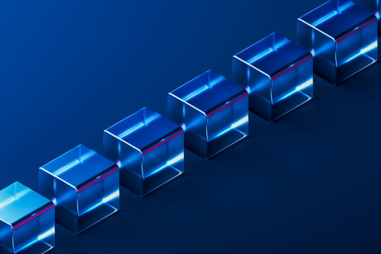 Abstract 3d rendering of glass cubes in a row on blue background