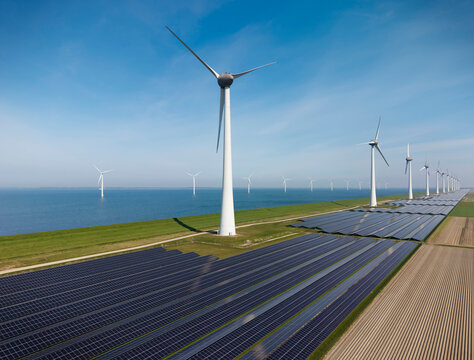 Wind turbines and solar panels at IJsselmeer