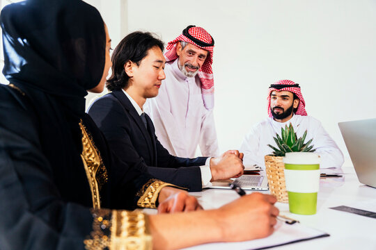 International business team during a corporate meeting in Riyadh
