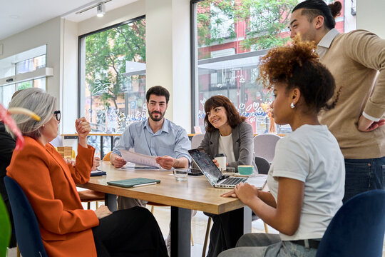 Business colleagues having a meeting in a bright modern office