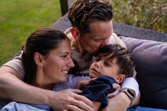 Playful family enjoying time together at home with love and affection