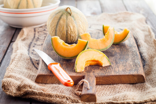 Whole and sliced Charentais melon