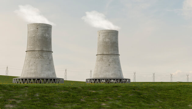 Cooling towers of a nuclear power plant in a green field