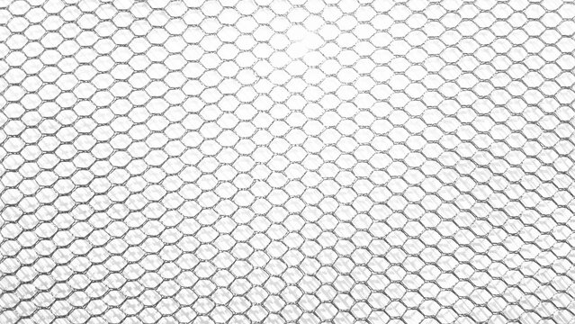 ​White abstract mesh texture background, close up of plastic net or hexagonal grid pattern with light gradient.