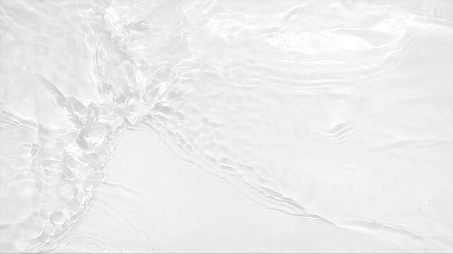 Pure beige water with reflections sunlight in slow motion. Water surface texture top view. Sun and shadows. Motion clean swimming pool ripples and wave.