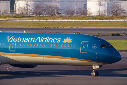 Narita, Chiba Japan - 2024 November 04: Close-up of the cockpit and front fuselage of a Vietnam Airlines Boeing 787-9 with registration VN-A872 taxiing at Narita International Airport.
