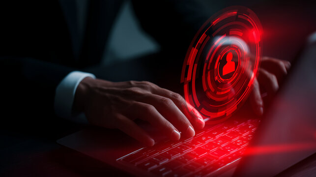 Businessperson Using Laptop with Red Cybersecurity Alert Interface, Digital Identity Protection, Data Breach Risk, Cloud Security, Login Warning, Network Threat Detection Stock Ima