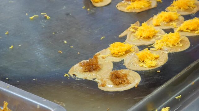 Making Khanom Buang (Thai crispy pancakes or crispy crepes), Traditional Thai snack