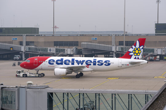 Edelweiss Air airplane type Airbus A320-214 registration HB-IHZ pushback at Swiss Z&uuml;rich Airport on an autumn day. Photo taken November 7th, 2025, Zurich Airport, Switzerland.