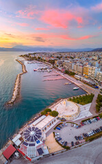 view of Patras, Greece, showcasing its coastal landscape, vibrant cityscape, and the beautiful Gulf of Patras, highlighting the blend of urban life, history, and Mediterranean scenery. © gatsi
