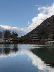 Fototapeta premium Traditional pavilion reflecting in Black Dragon Pool