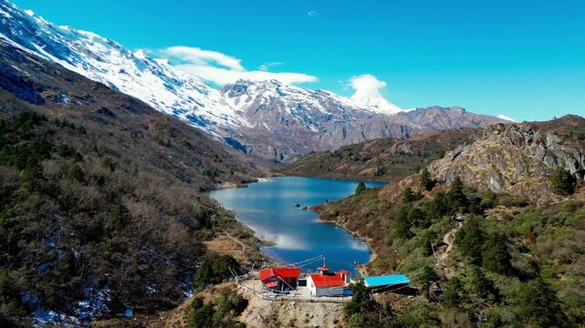 Aerial Flight Over Kaltal Lake with Manaslu Mountain in the Nepal Himalayas