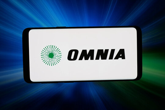 Stuttgart, Germany - 05-20-2026: In this photo illustration, the logo of chemicals company Omnia Holdings Limited is displayed on a smartphone in front of abstract background on computer screen.