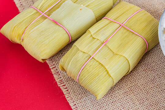 Brazilian pamonha corn snack with burlap texture