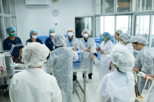 Inspector team investigate infection danger dirty area.Infection control team breved employee for dirty and danger tool after surgery in hospital.Contamination and people cleaning with PPE