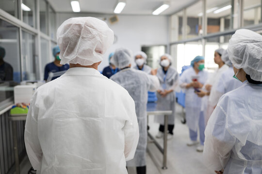 Inspector team investigate infection danger dirty area.Infection control team breved employee for dirty and danger tool after surgery in hospital.Contamination and people cleaning with PPE.