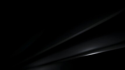 Fototapeta premium A high glossy black background featuring gentle shadows evoking a professional and elegant mood