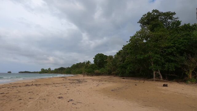 Atmospheric coastal landscape at Polo Beach on Isla Bastimentos, Bocas del Toro, Panama. 