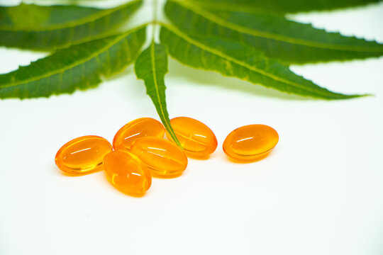 Vitamin d capsule isolated on white background. fish oil, omega 3, omega 6, omega 9, vitamin D, vitamin D3, vitamin E